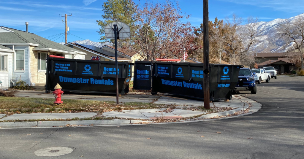 Friendly local team delivering a driveway-safe dumpster rental