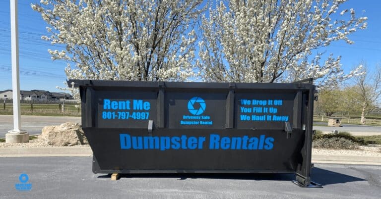 20-yard roll-off dumpster placed on a residential driveway