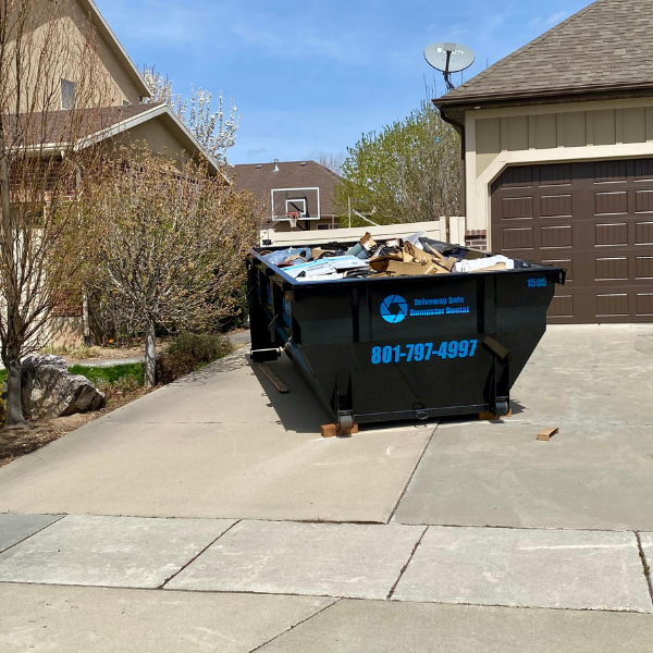 15-yard residential dumpster filled with renovation waste.