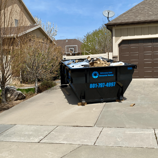 Example of a full garage cleanout showing the type of volume a 20 yard dumpster can hold